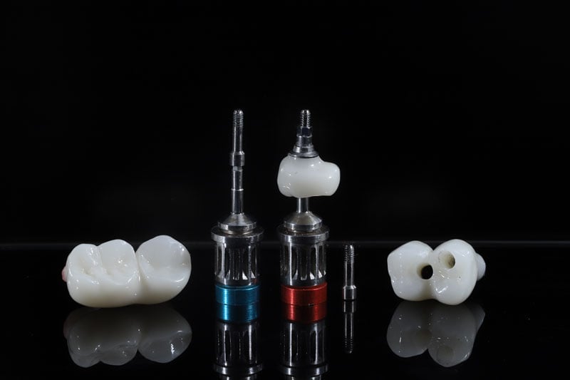 3 crowns with tools for placement nearby