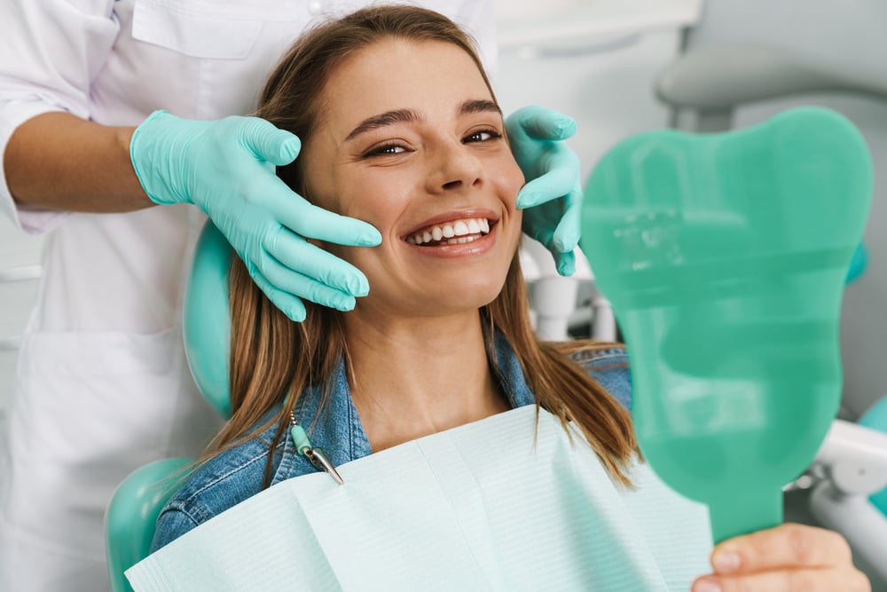 Dentist consulting with a patient about dental implants in St. Louis County